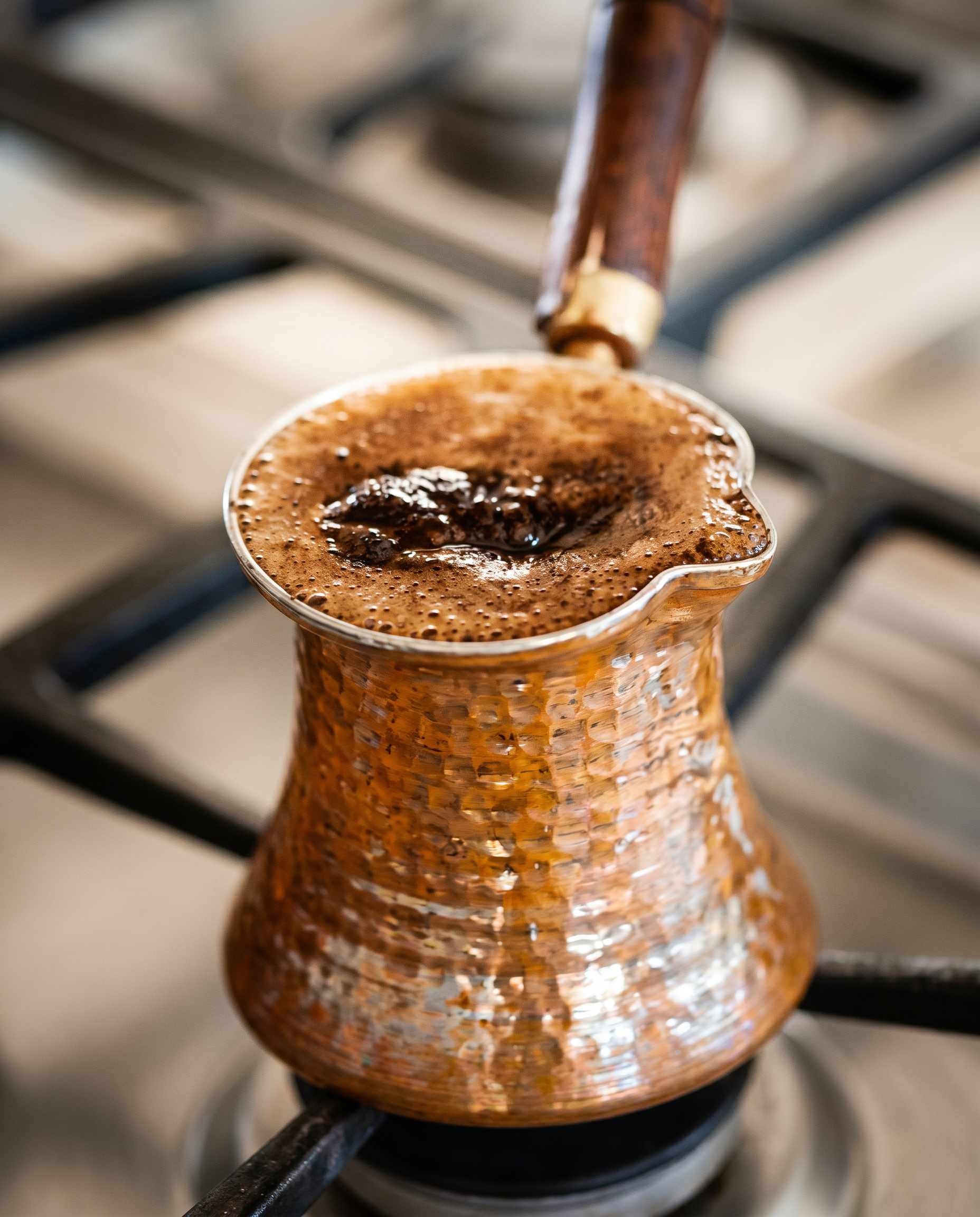 Turkish coffee brewing in a cezve
