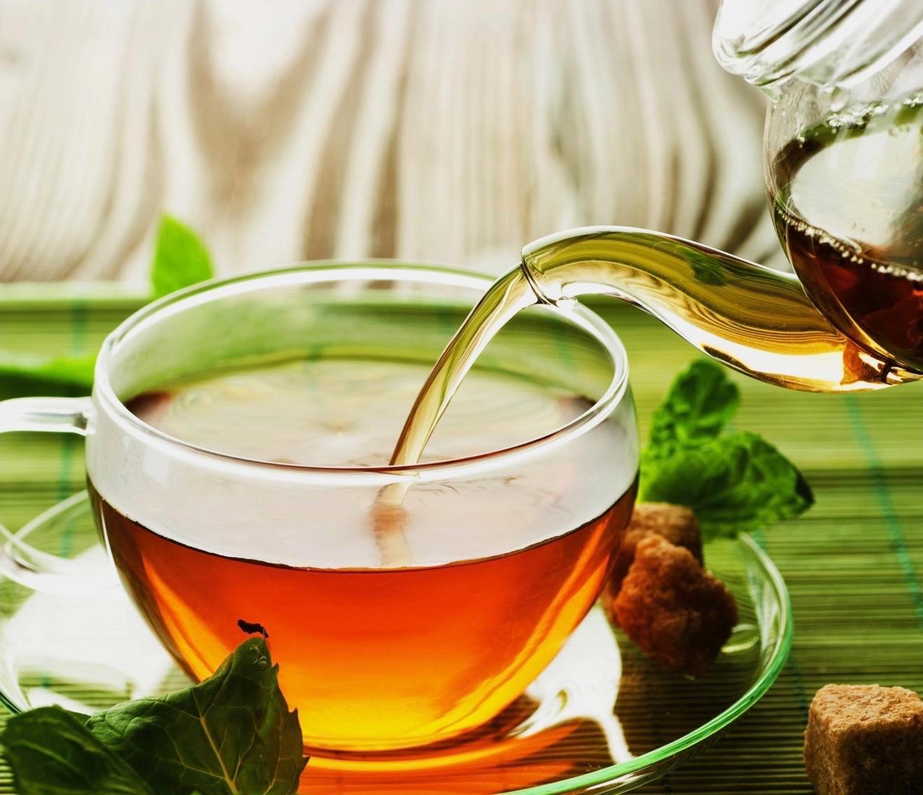 Herb tea being poured